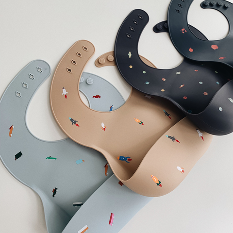 Mushie Baby Silicone Bibs - Prints (Assorted Colors) - Petit Fab